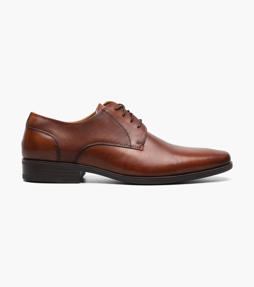 A Florsheim Plain Toe Oxford Cognac Shoe.