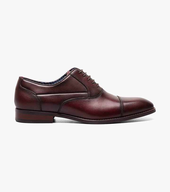 A Stacy Adams burgundy Kallum Cap Toe Oxford shoe featuring a burnished leather upper and a RedZone footbed.
