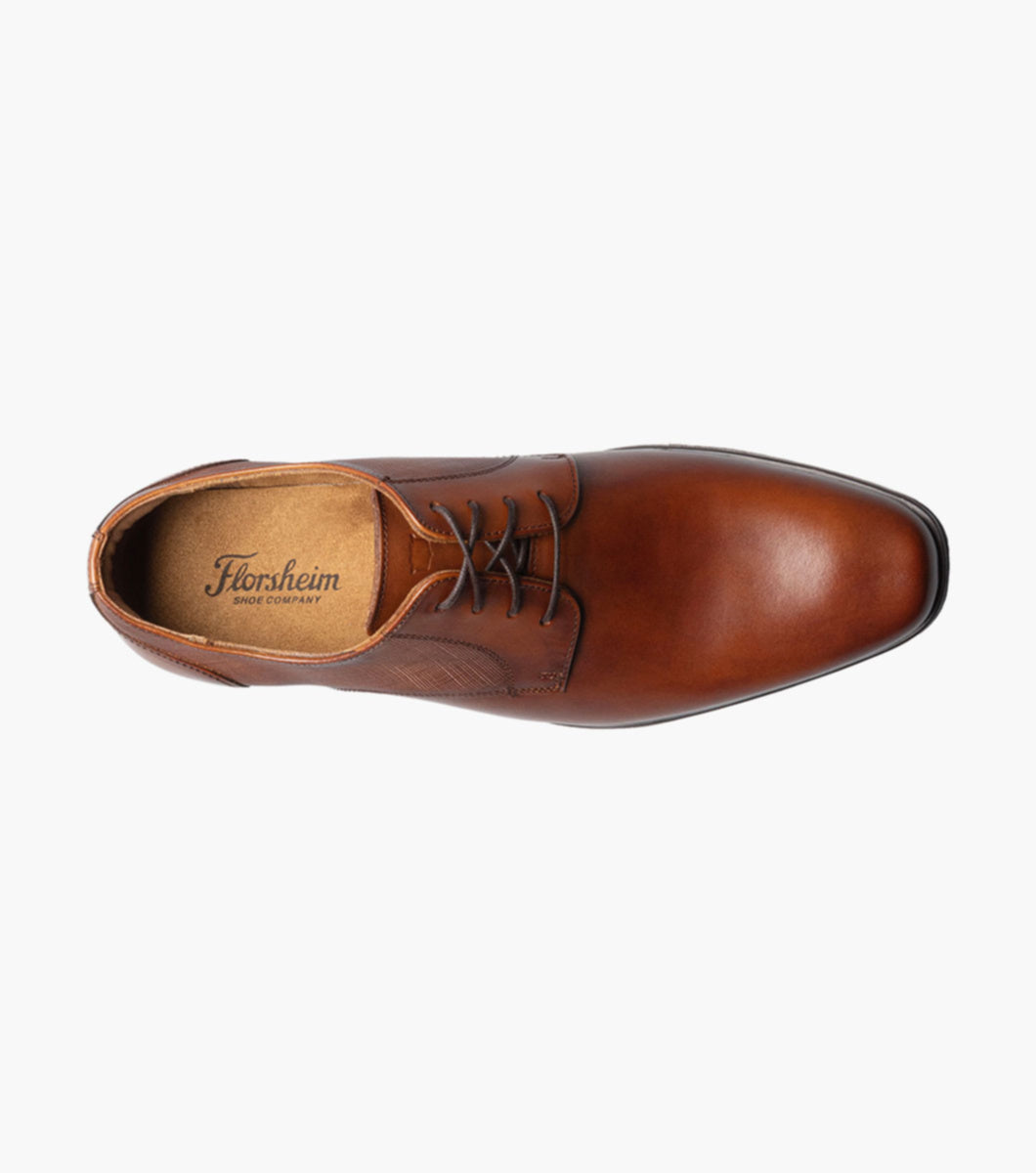 A Florsheim Plain Toe Oxford Cognac Shoe on a white background.