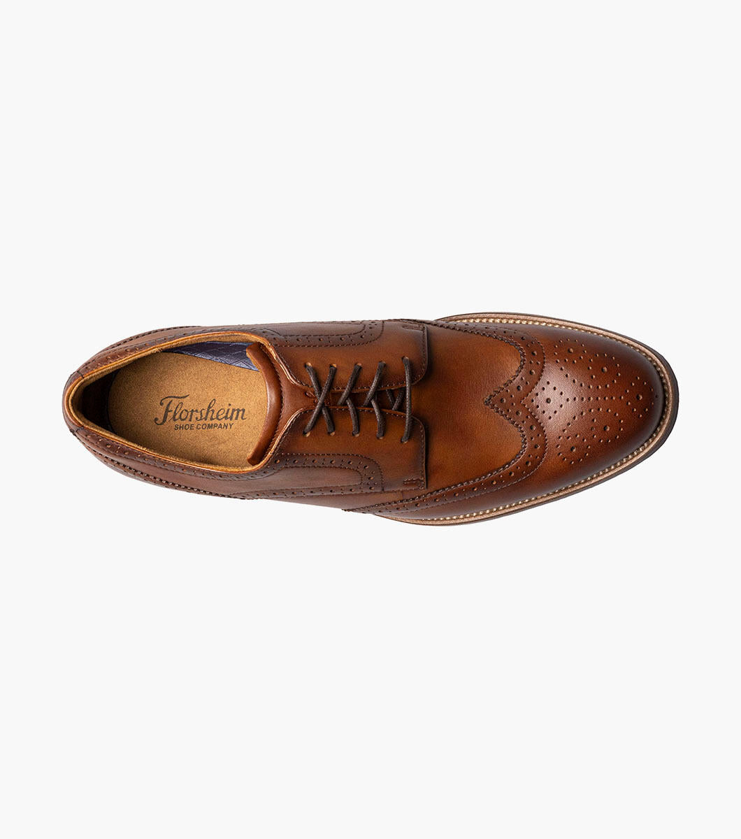 A Florsheim Cognac Wingtip Oxford Shoe in genuine leather on a white background.