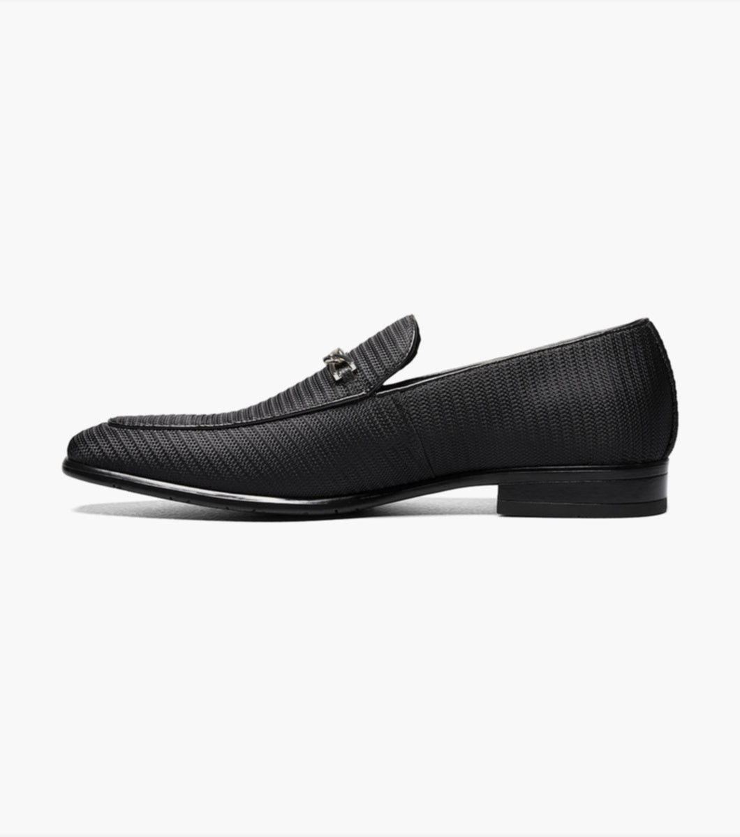 A Stacy Adams Black Tazio Moc Toe Bit Slip-on Shoes featuring a textured knit fabric upper and a Memory Foam footbed.