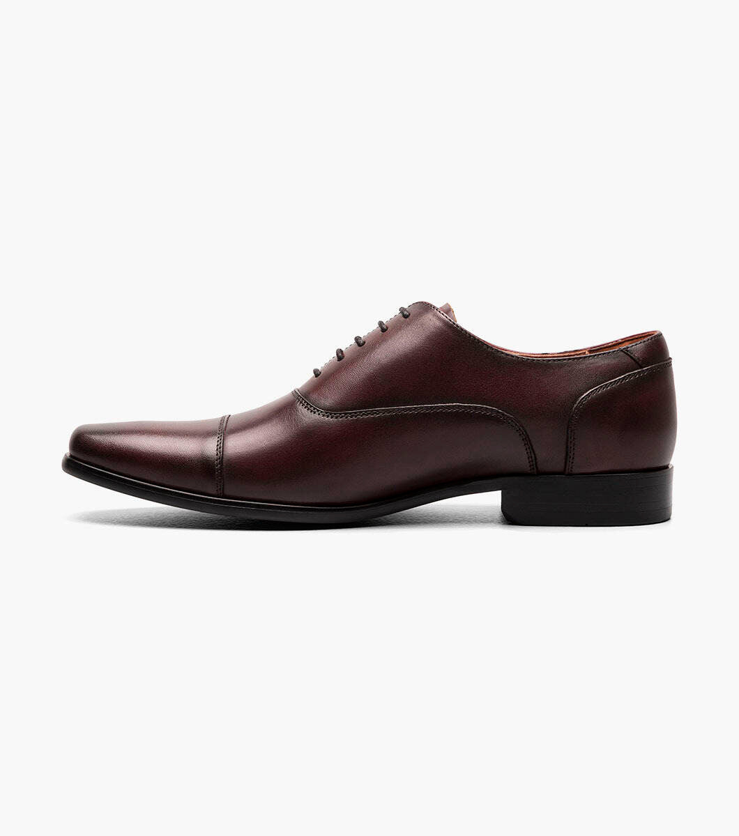 A Florsheim Wine Cap Toe Oxford Shoe offering all-day comfort.