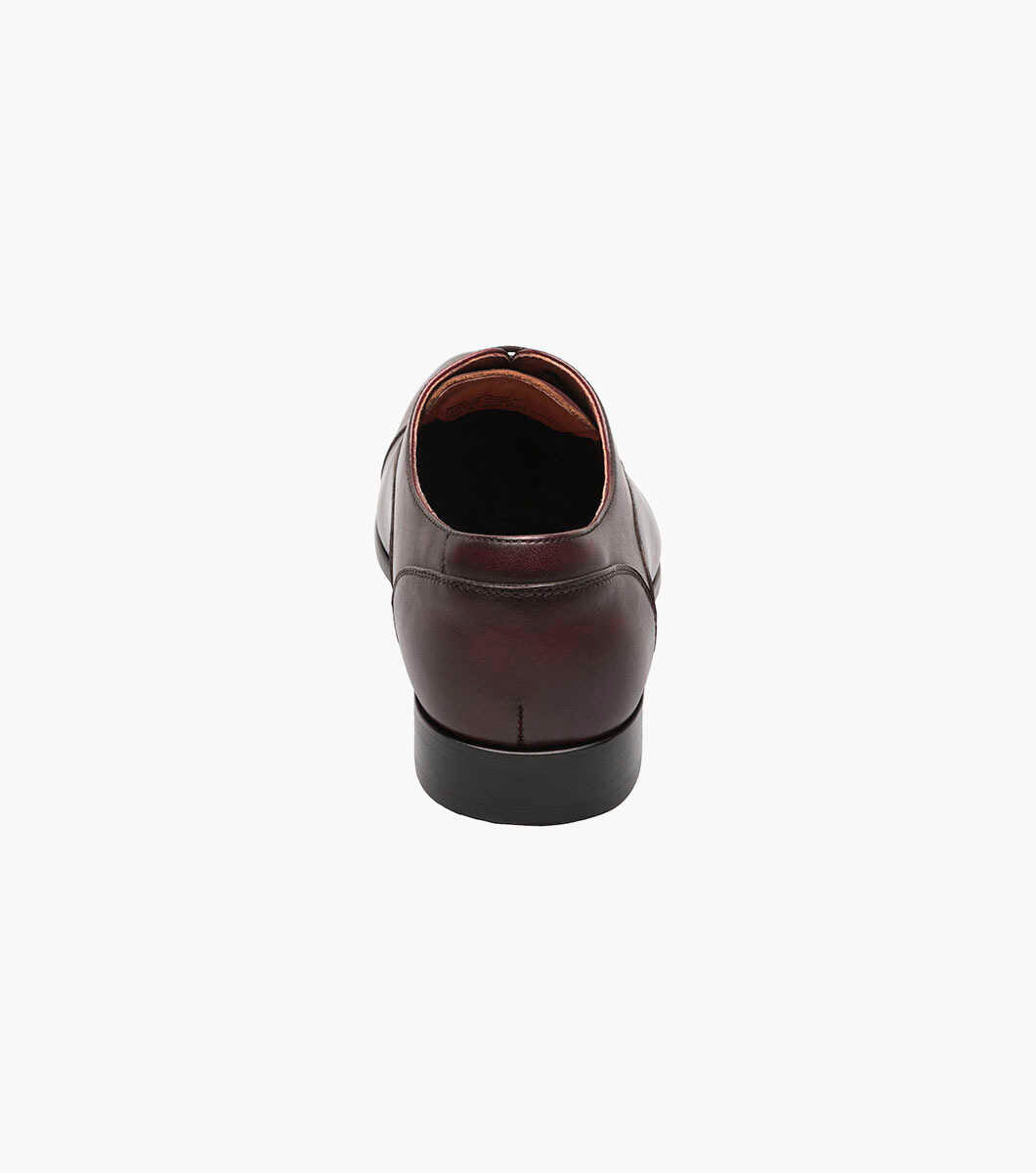 Florsheim Wine Cap Toe Oxford Shoe on a white background.