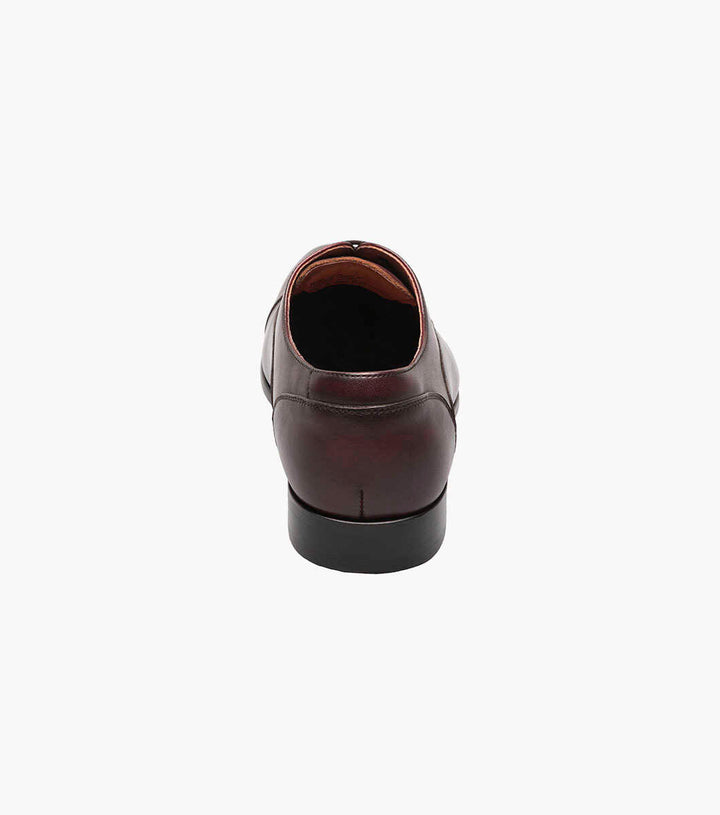 Florsheim Wine Cap Toe Oxford Shoe on a white background.