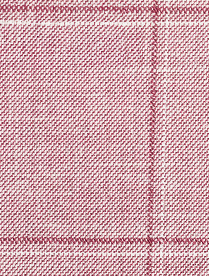 Close-up of the FUBU Rose with Cherry Windowpane Sport Jacket from Fubu The Colle, featuring a red and white plaid pattern, slim fit design, diagonal lines, and intersecting grids.