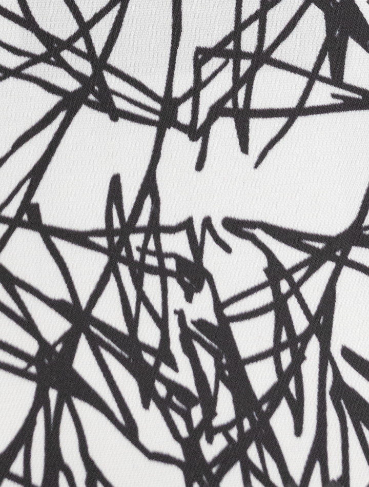The design is similar to the chaotic and overlapping abstract black lines found on a FUBU Light Grey with Charcoal Windowpane Vested Suit by Fubu The Colle.