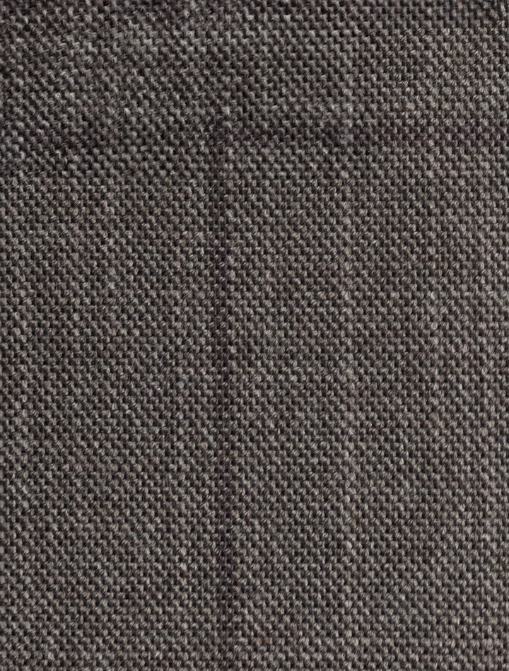 Close-up of the FUBU Taupe with Brown Windowpane Vested Suit textile by Fubu The Colle, featuring a dark gray, coarse woven texture ideal for crafting a slim fit suit.