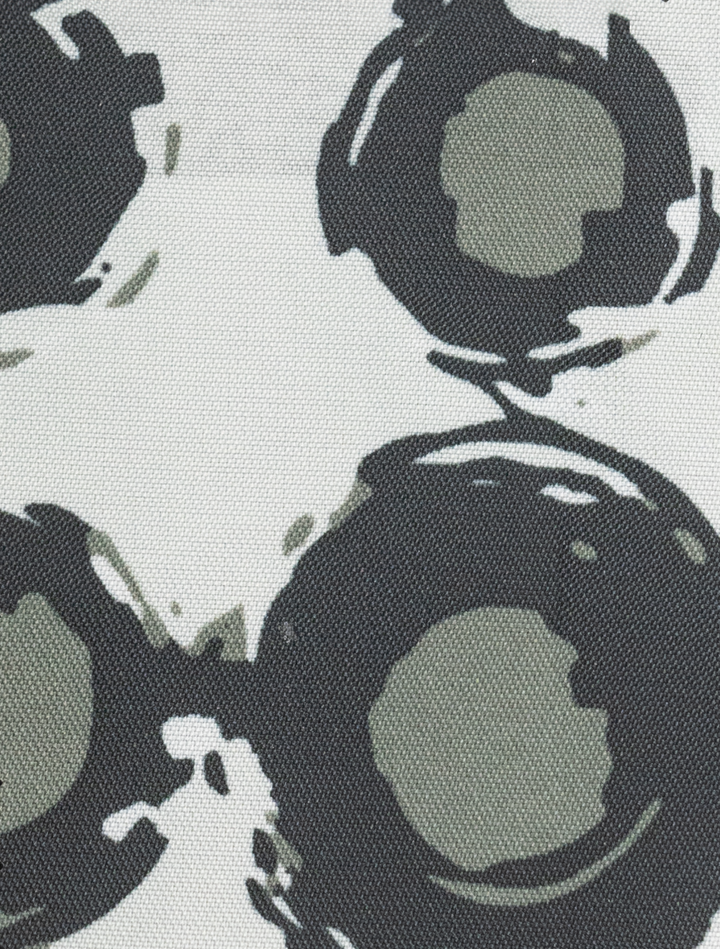 The FUBU Deep Olive with Navy Windowpane Sport Jacket by Fubu The Colle mirrors abstract dark circular shapes on light backgrounds, akin to ink splatters, capturing the creative essence found in bespoke fashion like Karako Suit stores.