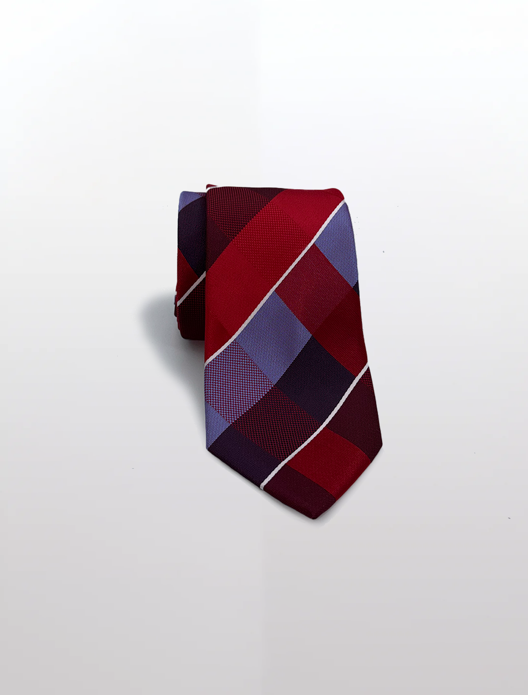 The Red with Lavender Gingham Patterned Microfiber Tie by Karako Collecti, ideal for weddings, features a striking red and purple checkered design with diagonal stripes, set against a plain white background.