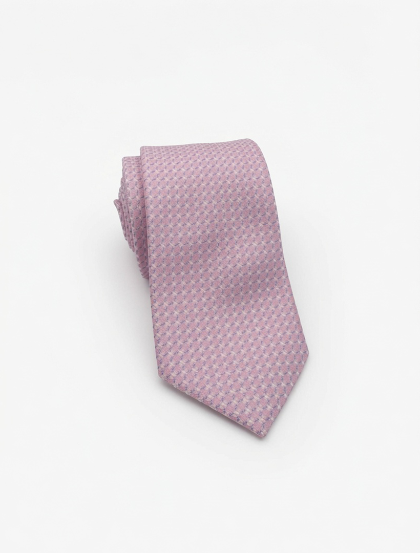 The Karako Collecti Pink and Blue Geometric Patterned Microfiber Tie is shown rolled on a plain white background—an ideal stylish accessory for men's suits or a refined choice for an elegant wedding tie.