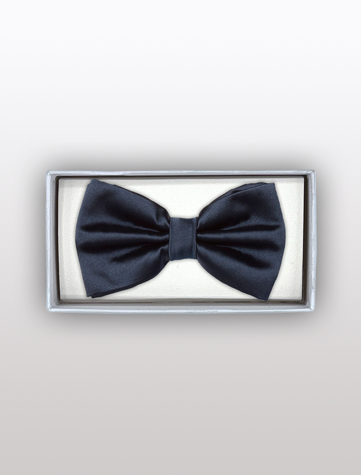 A navy bow tie crafted from satin polyester by Karako Collecti sits stylishly in a rectangular white box, ideal for formal occasions.