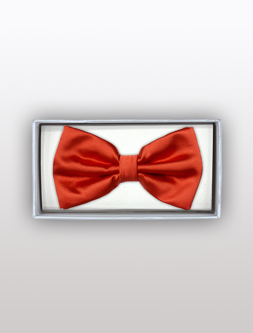 The Karako Collecti Mens Adjustable Pre-Tied Satin Bowtie in Red, elegantly crafted from satin polyester, comes neatly packaged in a white rectangular box, making it perfect for any formal occasion.