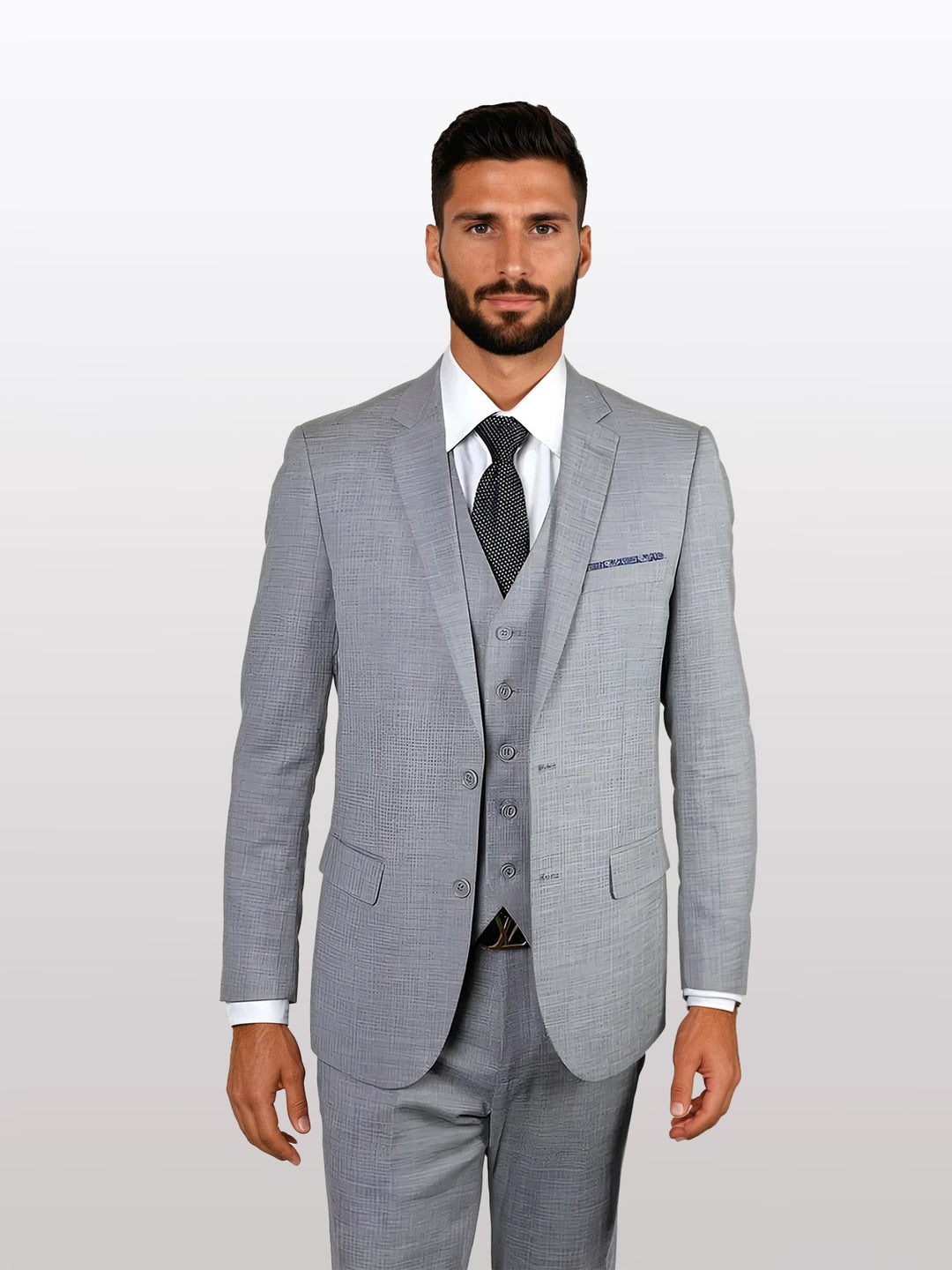 A man in a Statement Men's Dusty Grey 100% Wool Slim Fit Suit poses against a light gray background, highlighted by a crisp white shirt and dark tie.