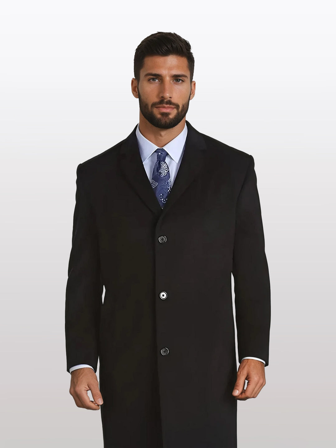 A man with short dark hair and a beard sports a Mallard Men's Black Wool Winter Top Coat, 45" in length, paired with a white dress shirt and blue patterned tie.