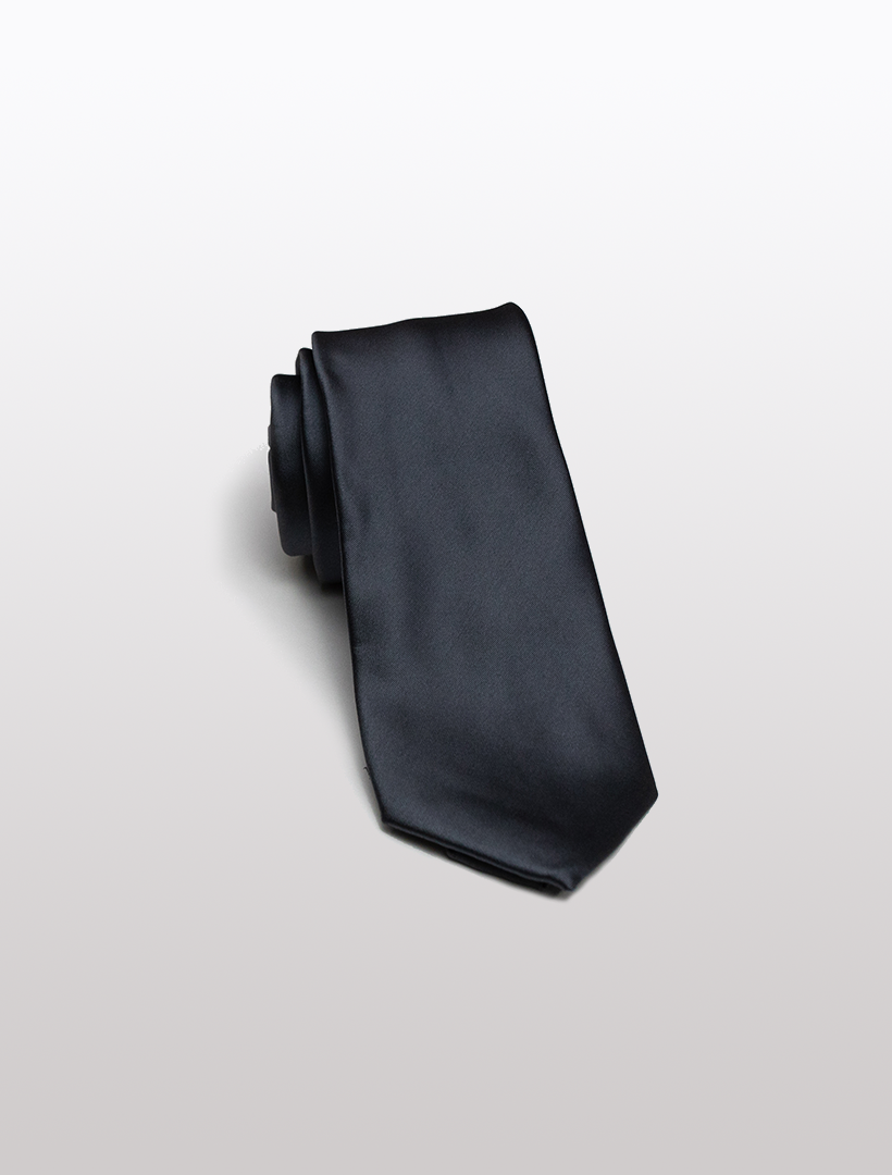 A sophisticated dark grey men's microfiber tie from Karako Collecti, elegantly rolled up on a light gray surface.