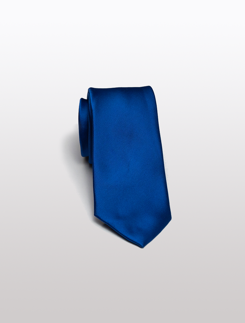 A rolled-up blue microfiber tie from Karako Collecti, perfect for complementing suits, rests elegantly on a white background.