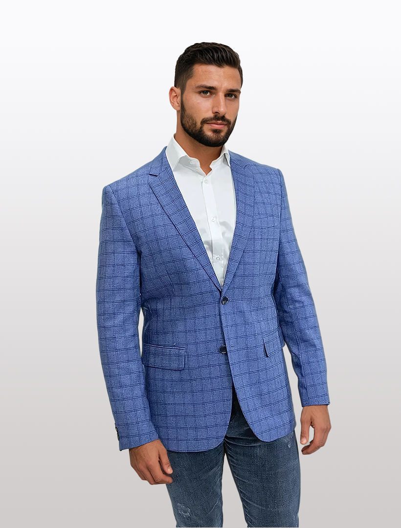 A man models a chic yet casual ensemble, featuring the FUBU Slim Fit Light Blue Windowpane Sport Jacket by Fubu The Colle, over a white shirt and jeans against a plain background.