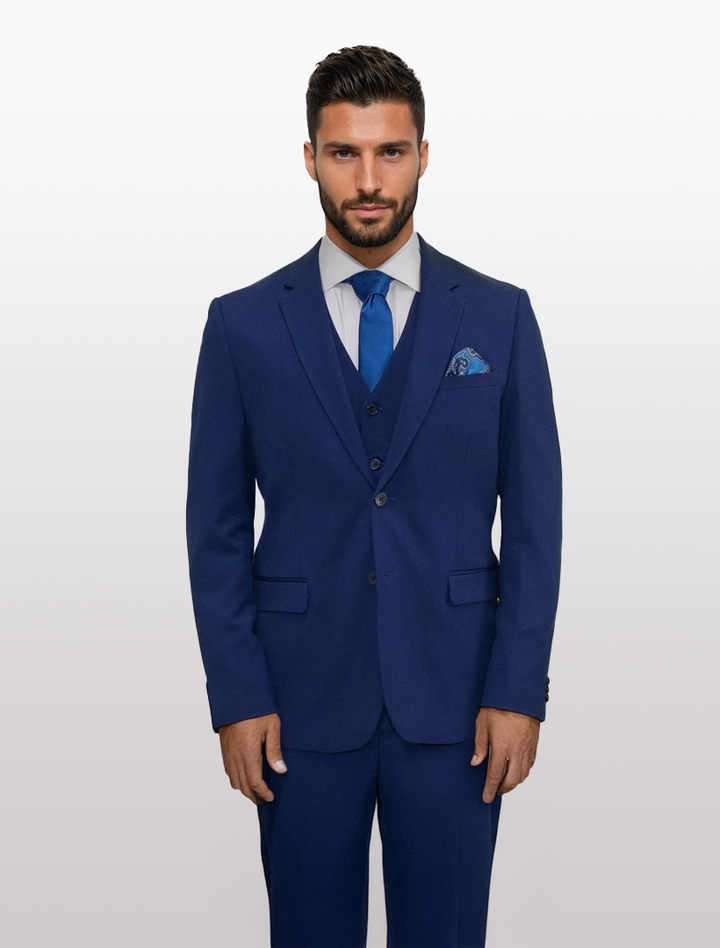 A man with dark hair and a beard wears the Blue Men&