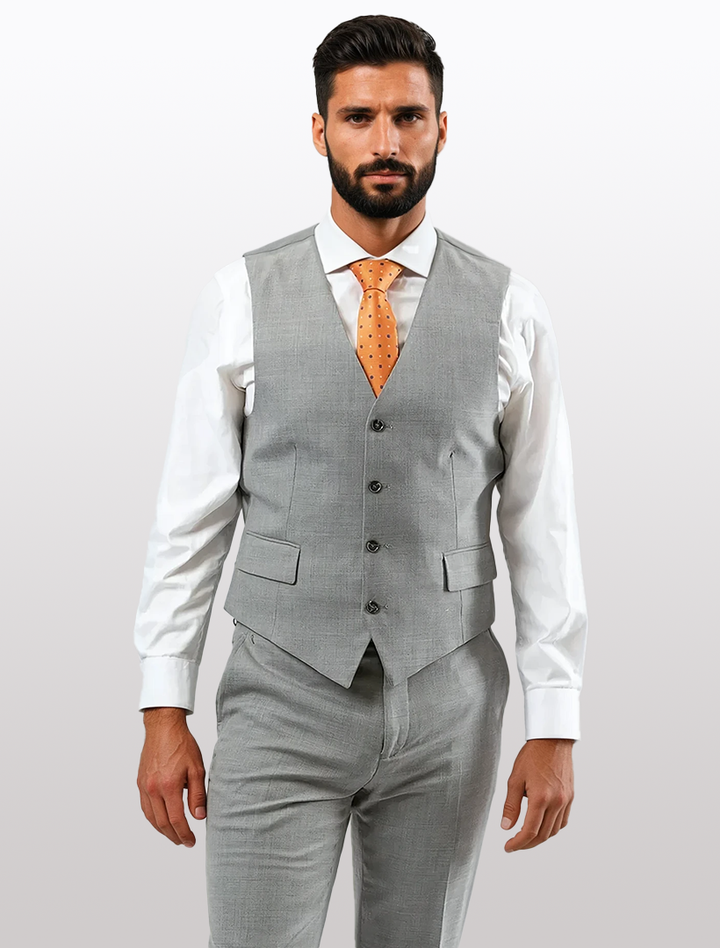 A man with dark hair and a beard wears the Light Grey Men&