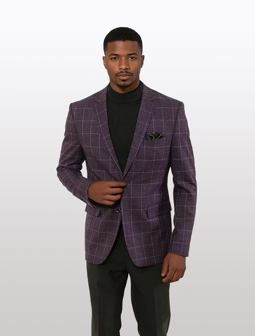 A man confidently wears a FUBU Purple with Grey Windowpane Slim Fit Sport Jacket by Fubu The Colle, paired with a sleek black turtleneck and dark pants, against a plain background.