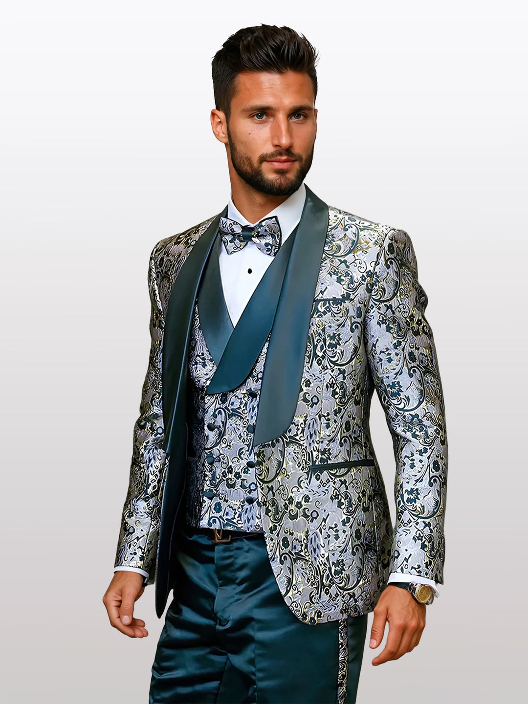 A person wearing the Statement Men's Hunter Green Patterned Vested Tuxedo with Bowtie, tailored to fit with intricate designs in green and gold, crafted from 100% wool.