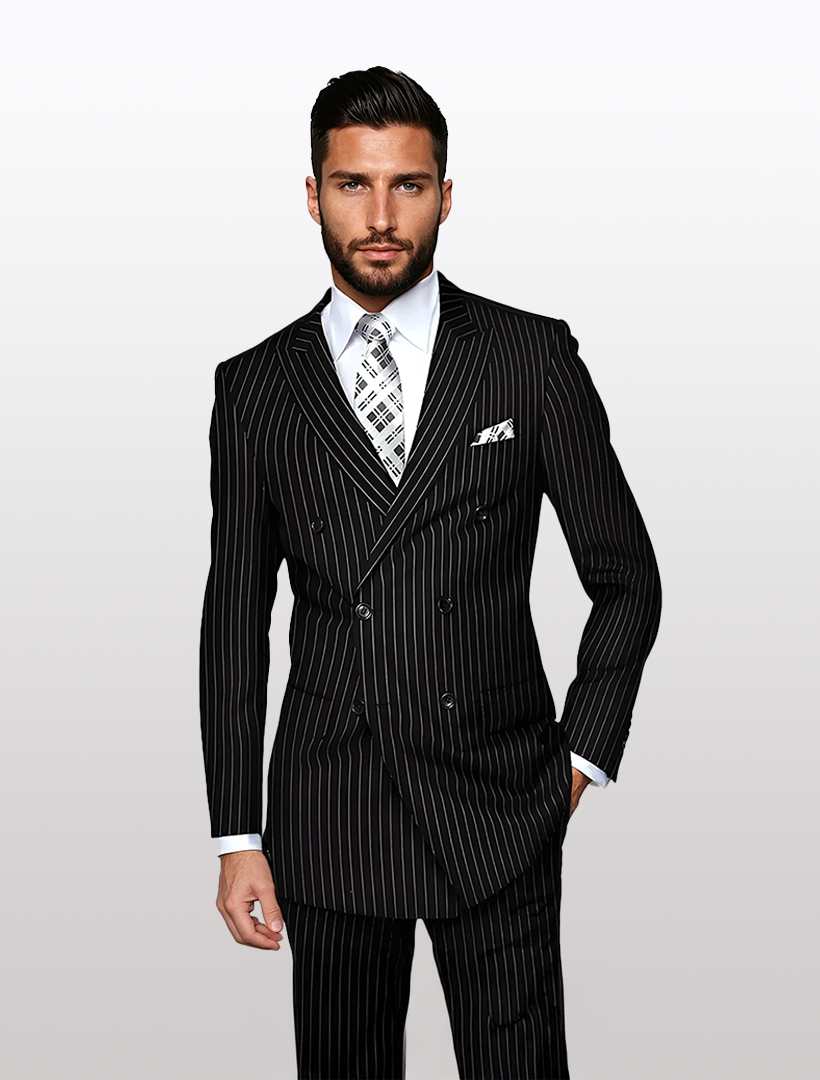 A man stands confidently against a neutral background in the Statement Men's Black Pin Stripe Double Breasted Suit. The impeccably tailored 100% wool suit features a modern fit and patterned tie, exuding sophistication and timeless style.