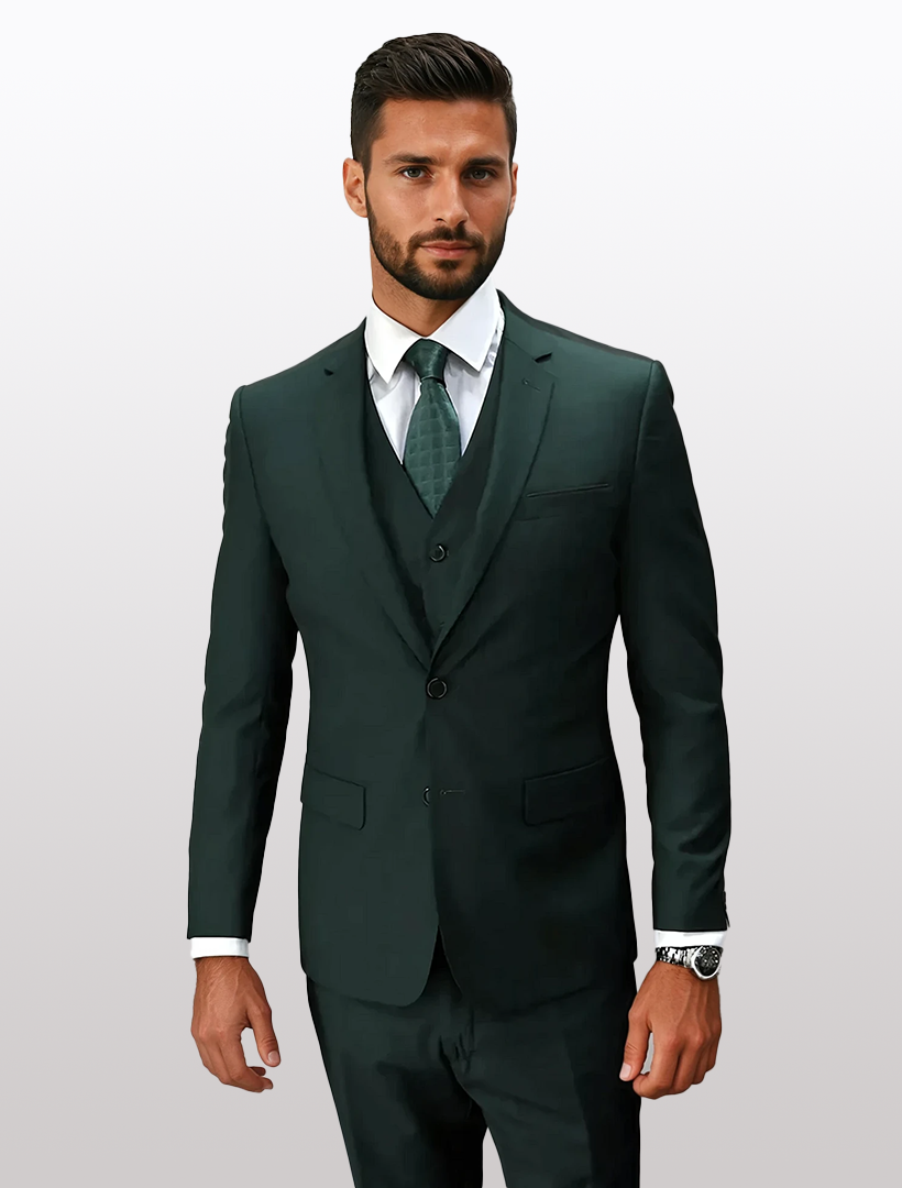 A man wearing a Statement Men's Hunter Green Slim Fit Vested Suit and tie stands against a neutral background.