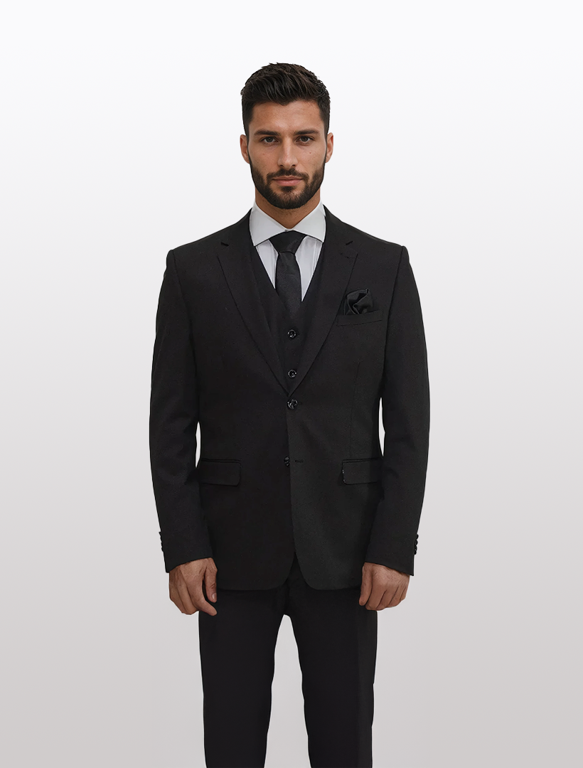A man in a FUBU Black Separates Slim-Fit Jacket by Fubu The Colle, complemented by a white shirt and black tie, stands confidently against a plain white background.
