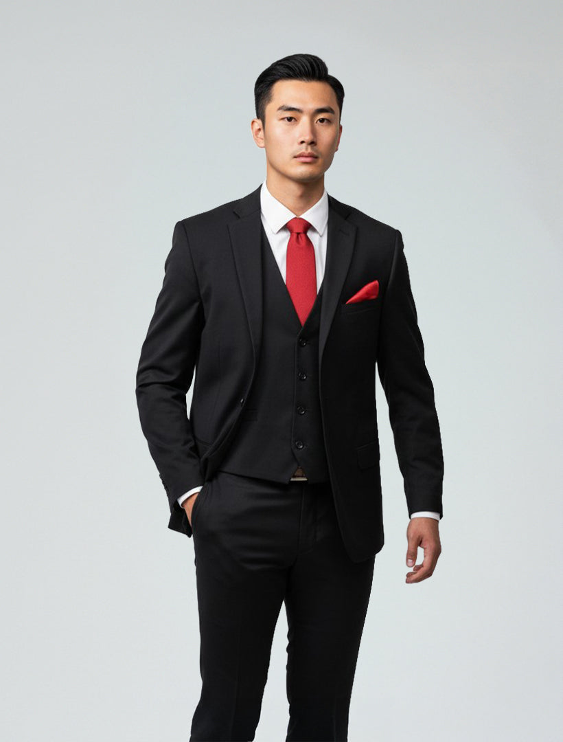 Man wearing the Black Men's Slim-Fit Suit Separates Jacket by Karako Separate, styled with a red tie and matching pocket square, stands against a plain light background.