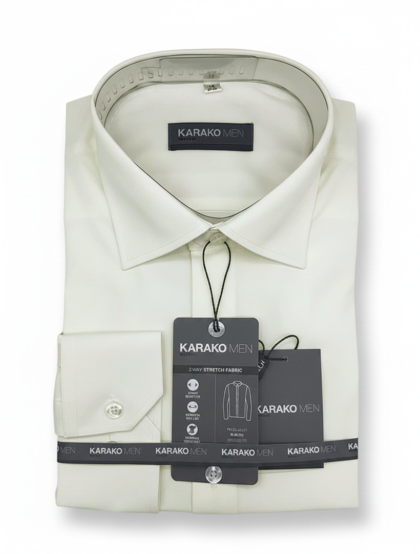 Folded Karako Men Bone Dress Shirt with tags labeled "KARAKO MEN," featuring a classic collar and single-button cuff, displayed against a white background. This men&