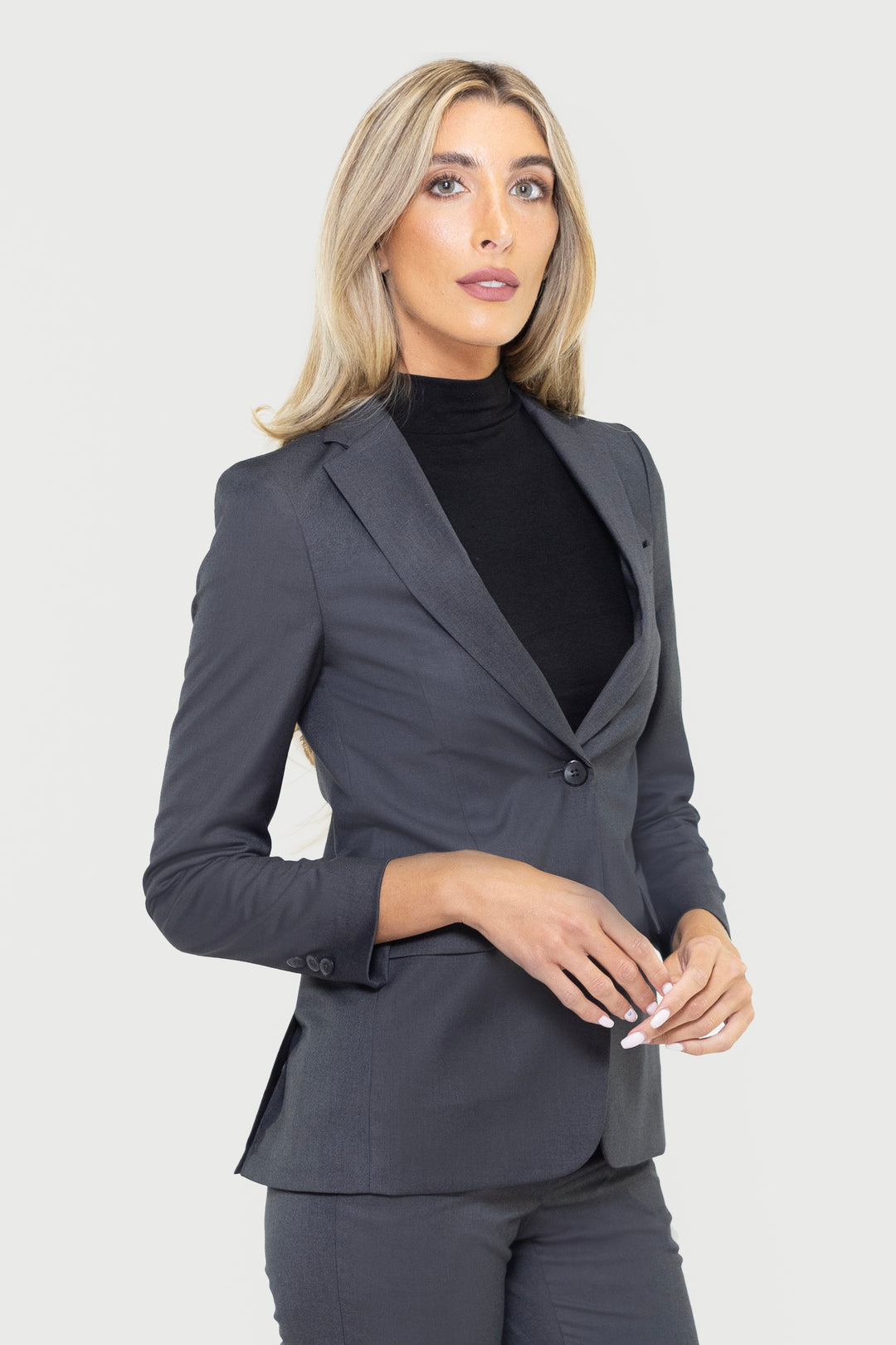 A person with long blonde hair wearing a Couture 1910 Women&