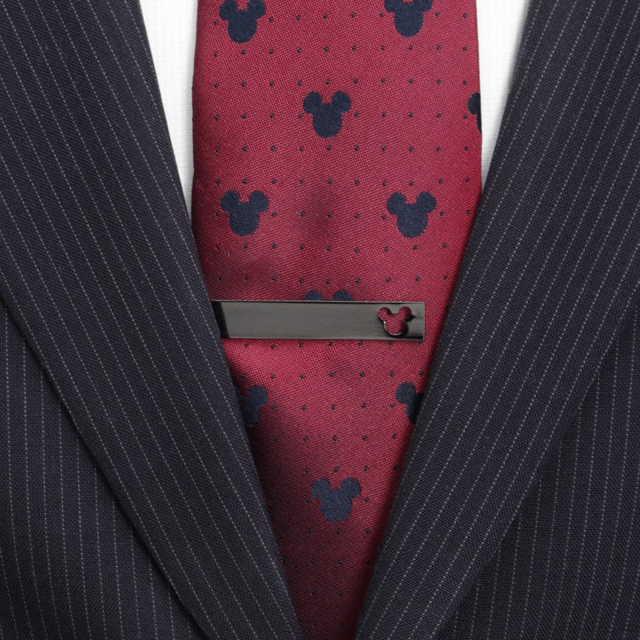Disney Mickey Mouse Cutout Black Tie Bar worn on a red polka-dot tie with a dark suit.