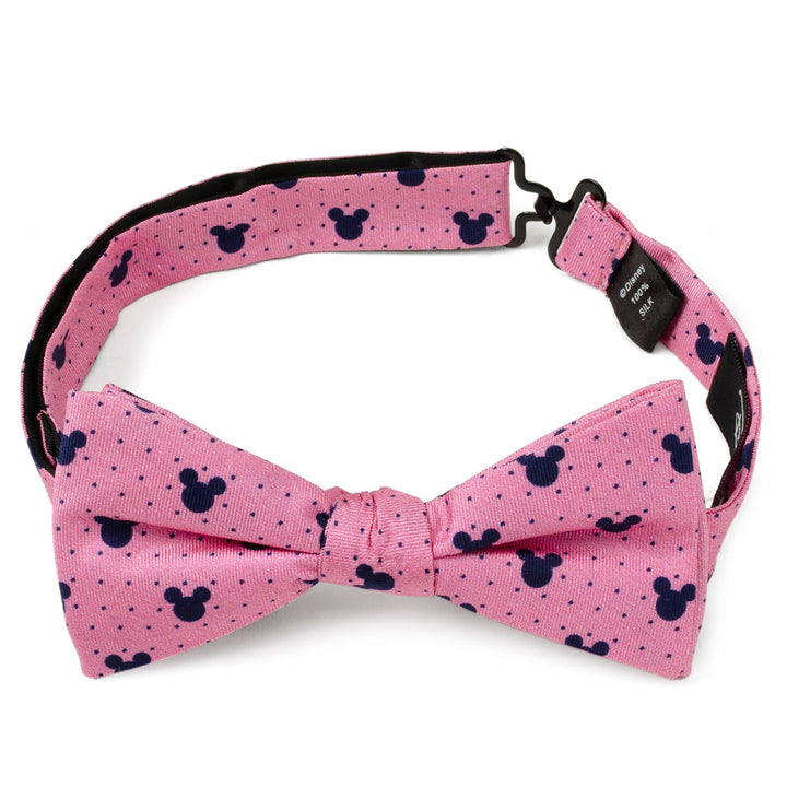 Disney Mickey Mouse Pink Dot Silhouette Pre-Tied Bow Tie in pink with a pattern of dark blue polka dots and subtle character silhouettes.