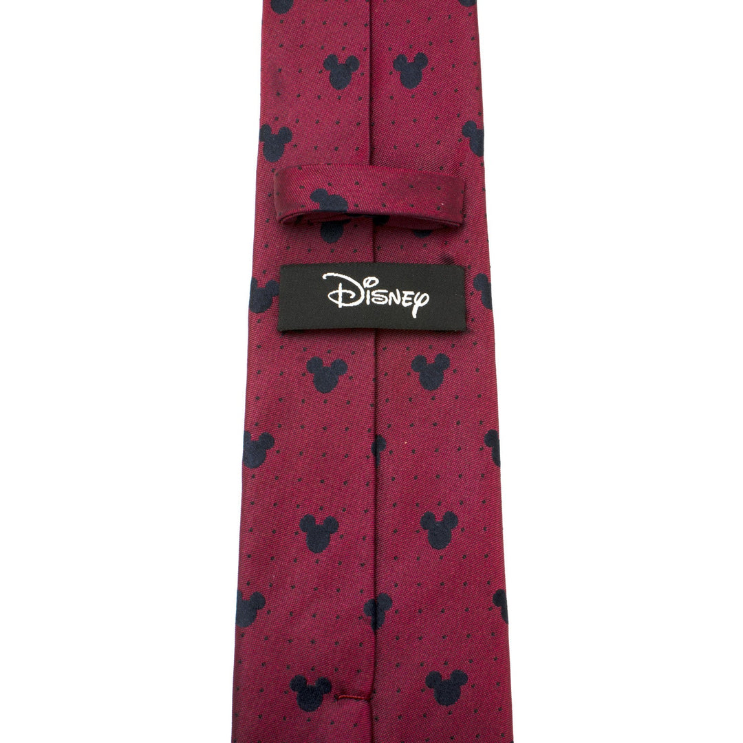 Disney Mickey Mouse Red Pin Dot Men’s Tie in red silk with a pattern of dark Mickey Mouse silhouettes and small dots, featuring a black Disney label on the back.