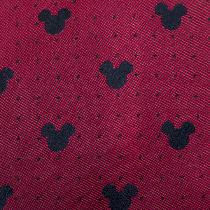 Disney Mickey Mouse Red Pin Dot Men’s Tie in red silk with a repeating pattern of dark silhouettes and small black dots.