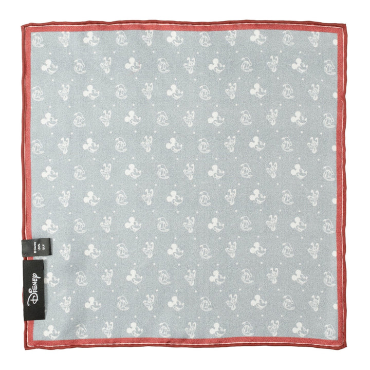 Light blue Disney Mickey and Friends Pocket Square featuring a repeating pattern of white Mickey Mouse silhouettes and small dots, finished with a red border.