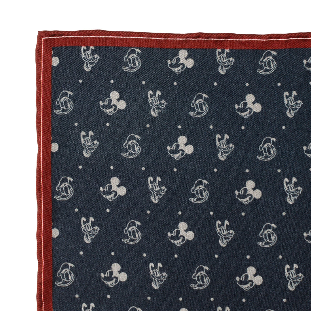 Disney Mickey and Friends Pocket Square in dark blue with a repeating white Mickey Mouse head and dot pattern, finished with a thin red edge.