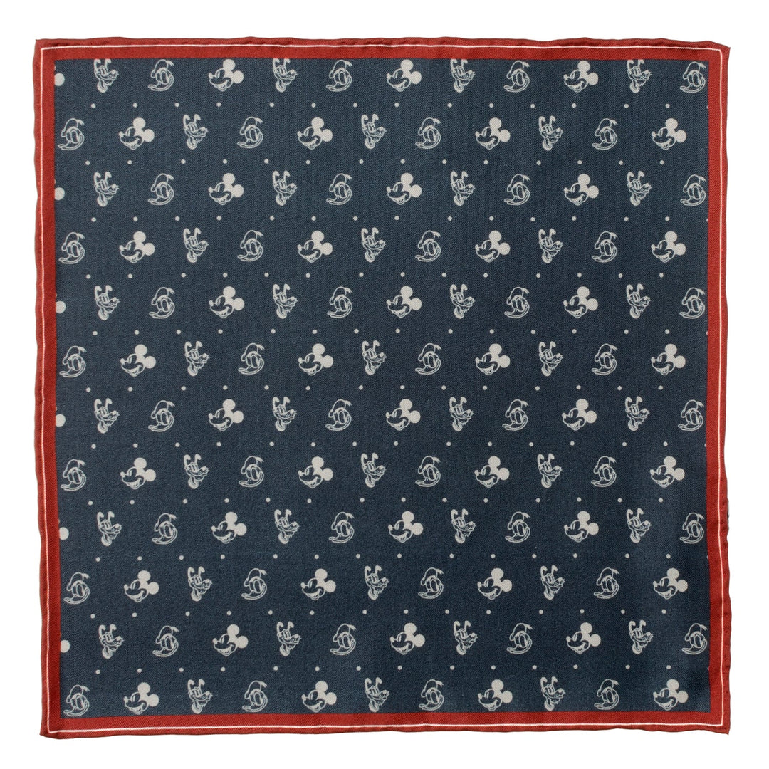 Disney Mickey and Friends Pocket Square in navy blue silk with a white polka dot and Mickey Mouse head pattern, framed by a red border.
