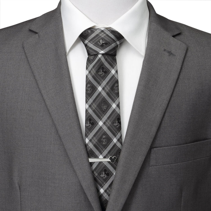 Disney Mickey and Friends Charcoal Plaid Men’s Tie in dark grey and white, featuring repeating Mickey Mouse silhouettes and a silver tie bar with a Mickey icon.