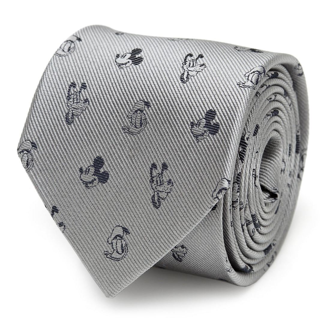 A rolled gray 100% silk Disney Mickey and Friends Gray Men’s Tie featuring a repeating pattern of Mickey and Friends.