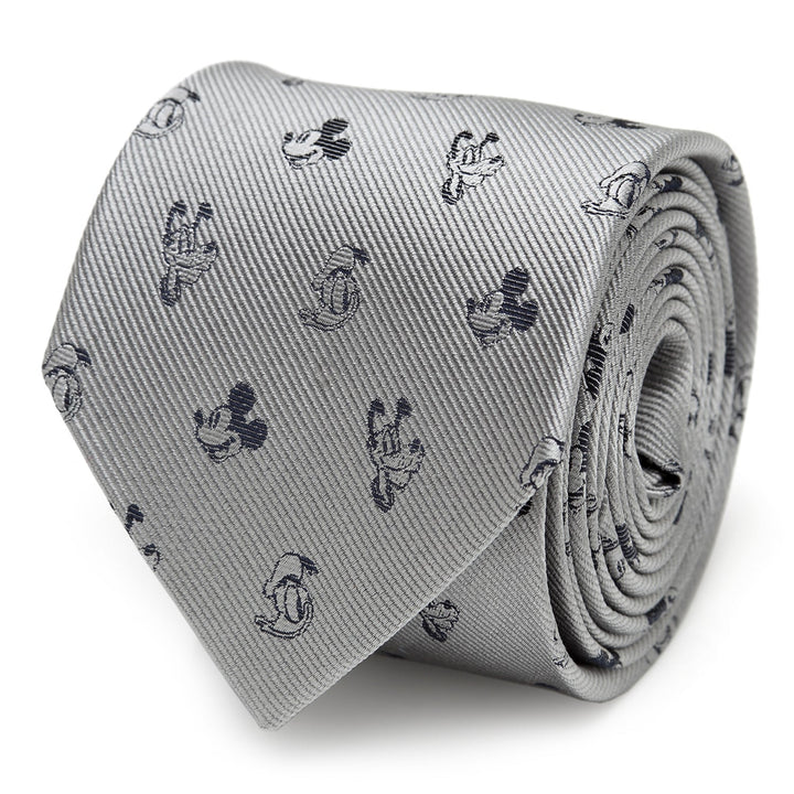 A rolled gray 100% silk Disney Mickey and Friends Gray Men’s Tie featuring a repeating pattern of Mickey and Friends.