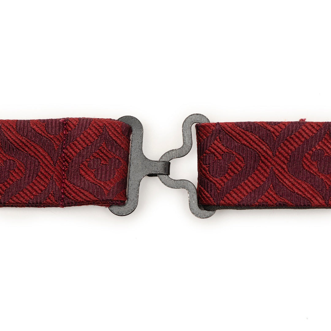 Disney Mickey Mouse Holiday Maroon Bow Tie in silk with a repeating Mickey Mouse silhouette pattern and a dark metal hook-and-eye closure.