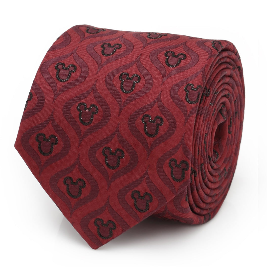 Rolled burgundy Disney Mickey Mouse Holiday Metallic Black Silk Men’s Tie featuring a repeating pattern of dark silhouettes within wavy shapes.
