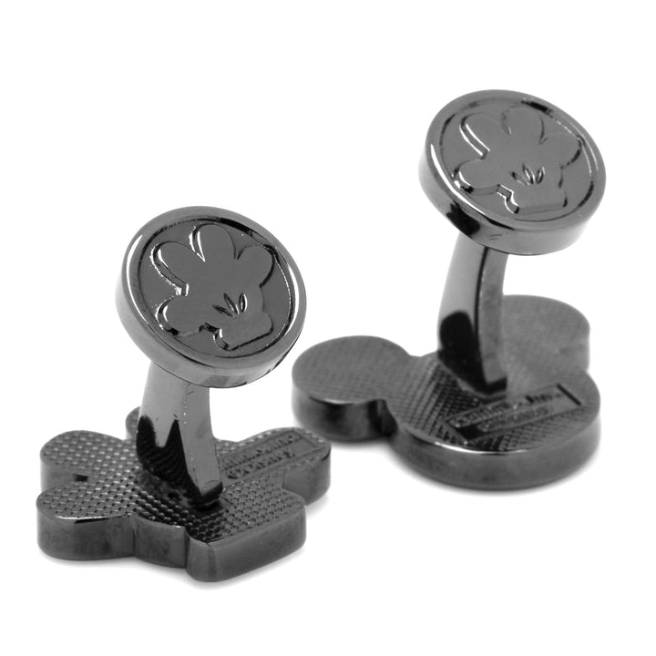 Disney Mickey Mouse Helping Hand Cufflinks in dark metal, featuring a glove icon on the face and a silhouette of Mickey’s head on the backing.