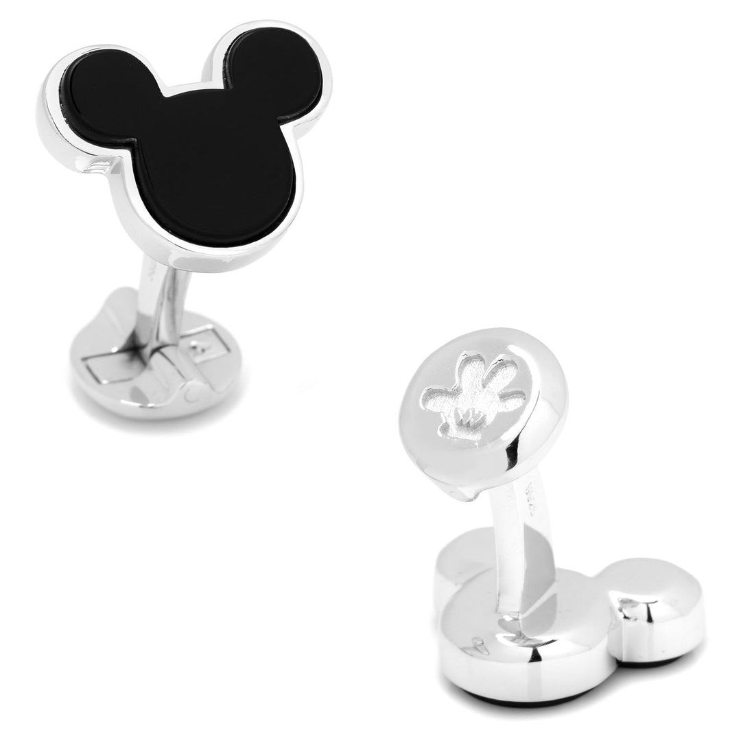Disney Mickey Mouse Sterling Silver and Onyx Cufflinks: one featuring a Mickey Mouse head with black onyx inlay, the other with an embossed glove design on the backing.