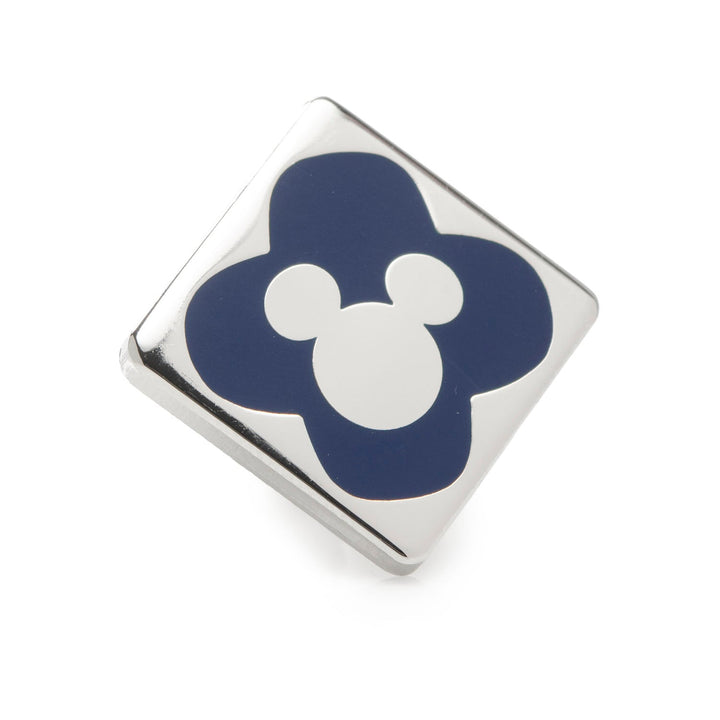 Square metal Mickey lapel pin from the Disney Mickey Mouse Holiday Truck Navy Socks and Blue Lapel Pin Gift Set, featuring a white Mickey Mouse silhouette centered on a dark blue four-leaf clover shape.