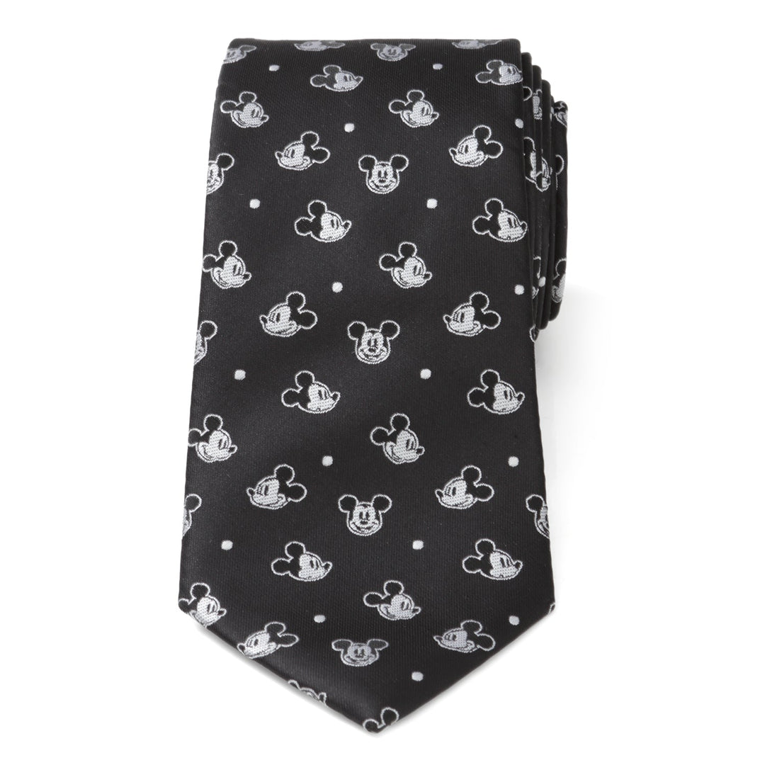 Disney Mickey Mouse Black Dot Men’s Tie in black with a repeating pattern of white Mickey Mouse heads and small white dots.
