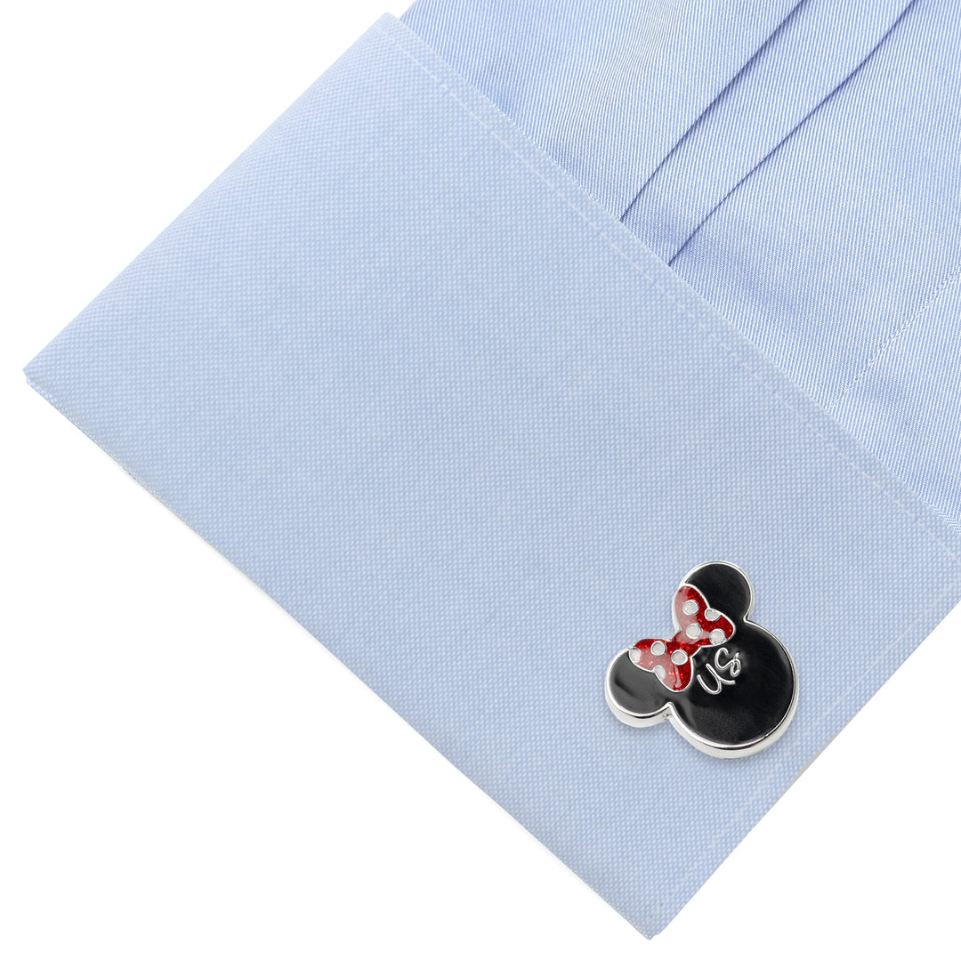 Disney Mickey and Minnie Mouse “I Love Us” Cufflinks shaped like Mickey Mouse with a red polka-dot bow on a light blue French cuff.
