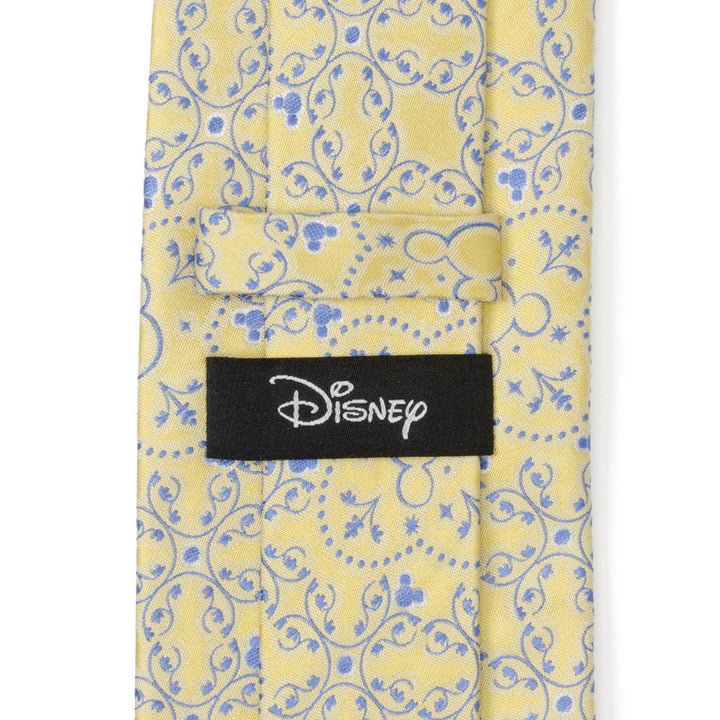 Disney Mickey Mouse Yellow Multi Men’s Tie in yellow with a light blue floral paisley pattern, hidden Mickey silhouettes, and a black brand label on the back.