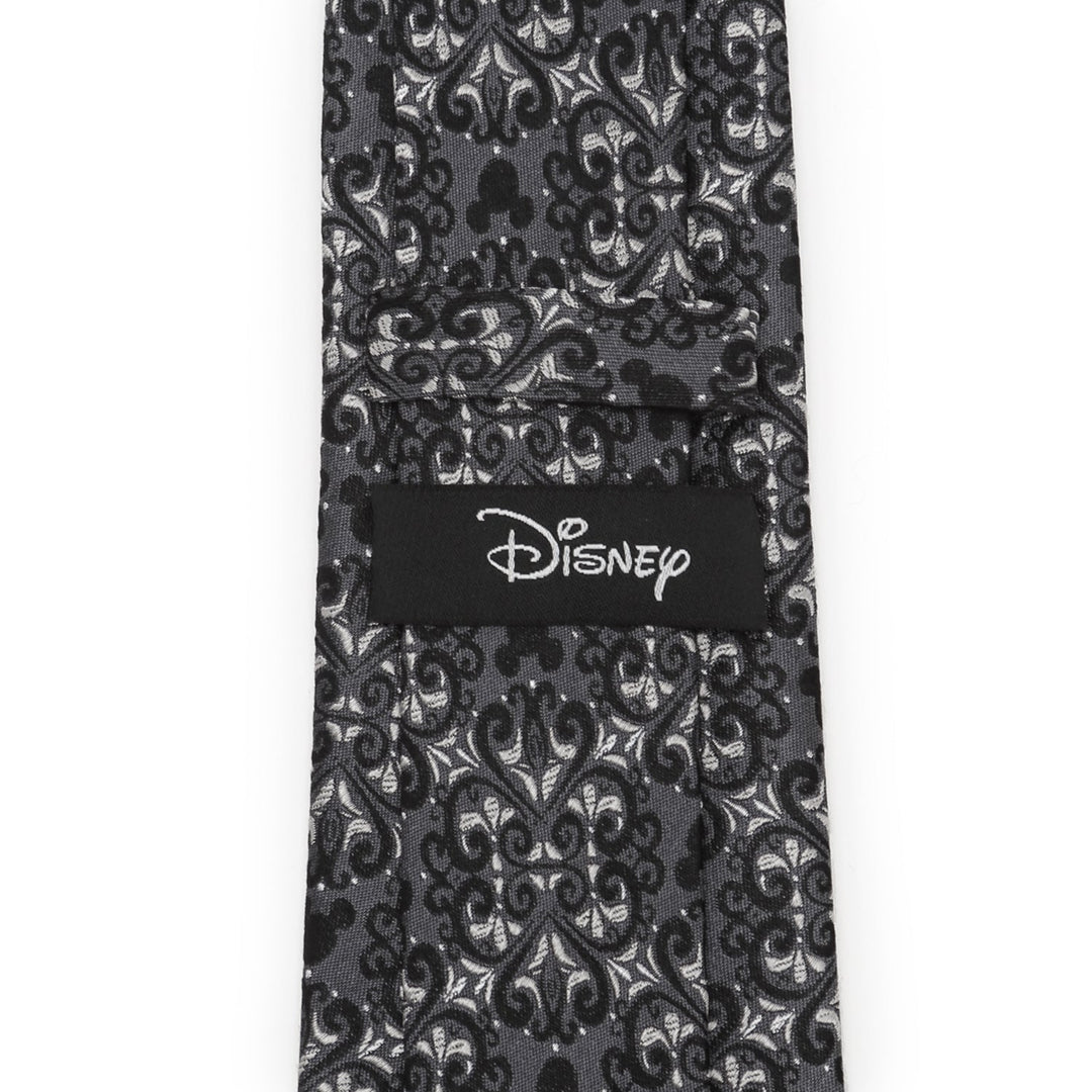 Disney Mickey Mouse Damask Tile Men’s Tie in black and gray silk with a repeating damask pattern, hidden silhouettes, and a Disney label on the back.